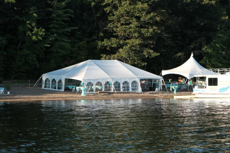 Elegant white event tent rentals set up outdoors in Ledgewood, NJ, perfect for weddings, parties, and special occasions.